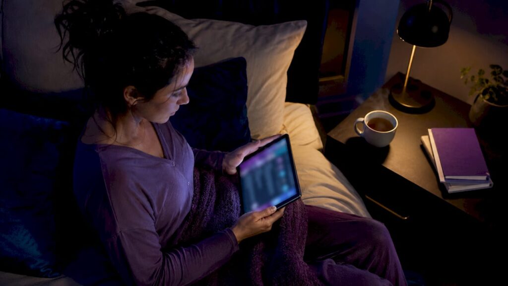 Person using AI mental health app at home
