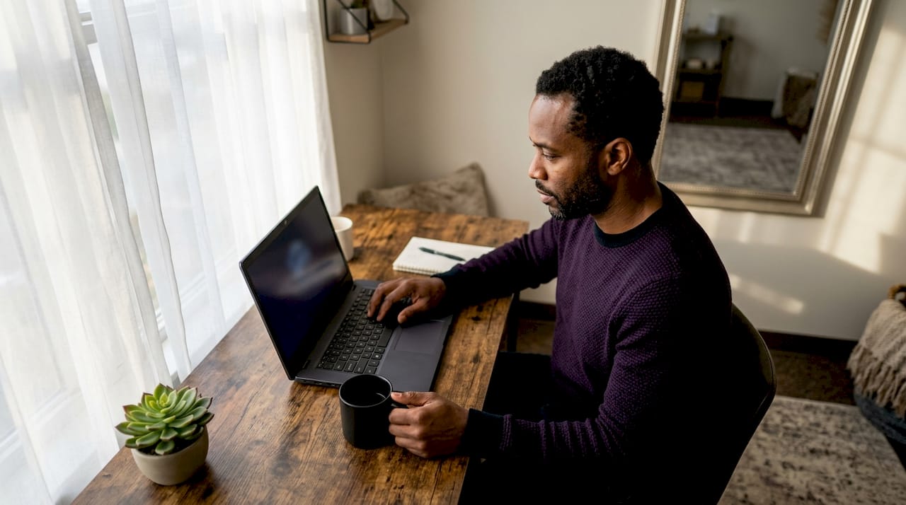 Therapist using laptop for Woebot AI chatbot